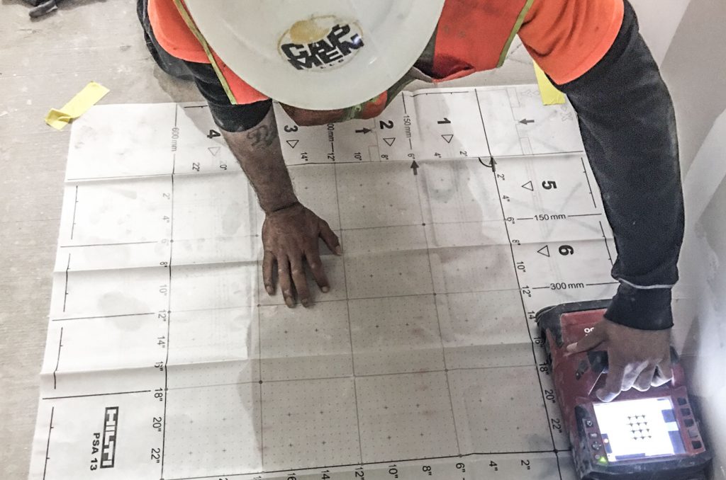 Capmen’s GPR technician scans the nine-inch concrete slab looking for post-tension cables, electrical conduit or other materials